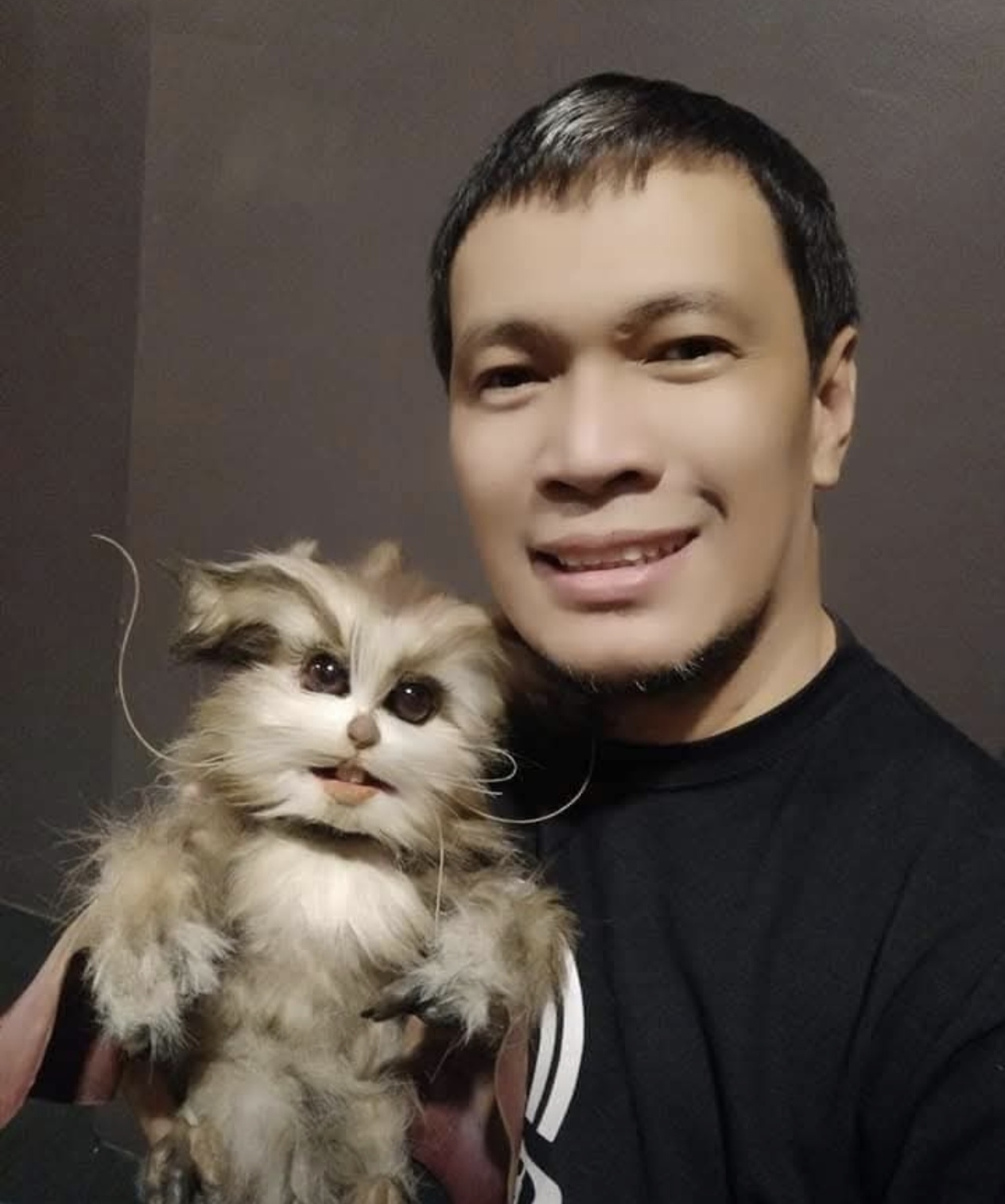 Noel Urbano with the Ratty puppet